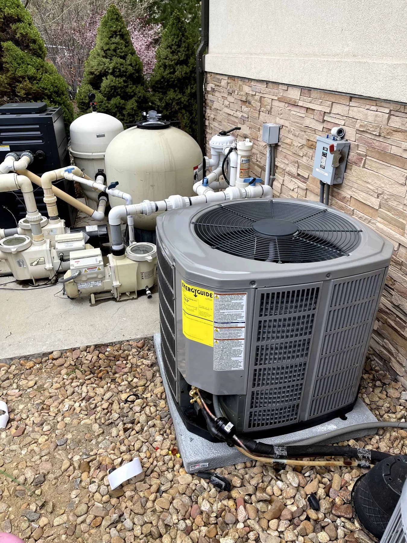 trane condenser energyguide label gravel bed stone wall